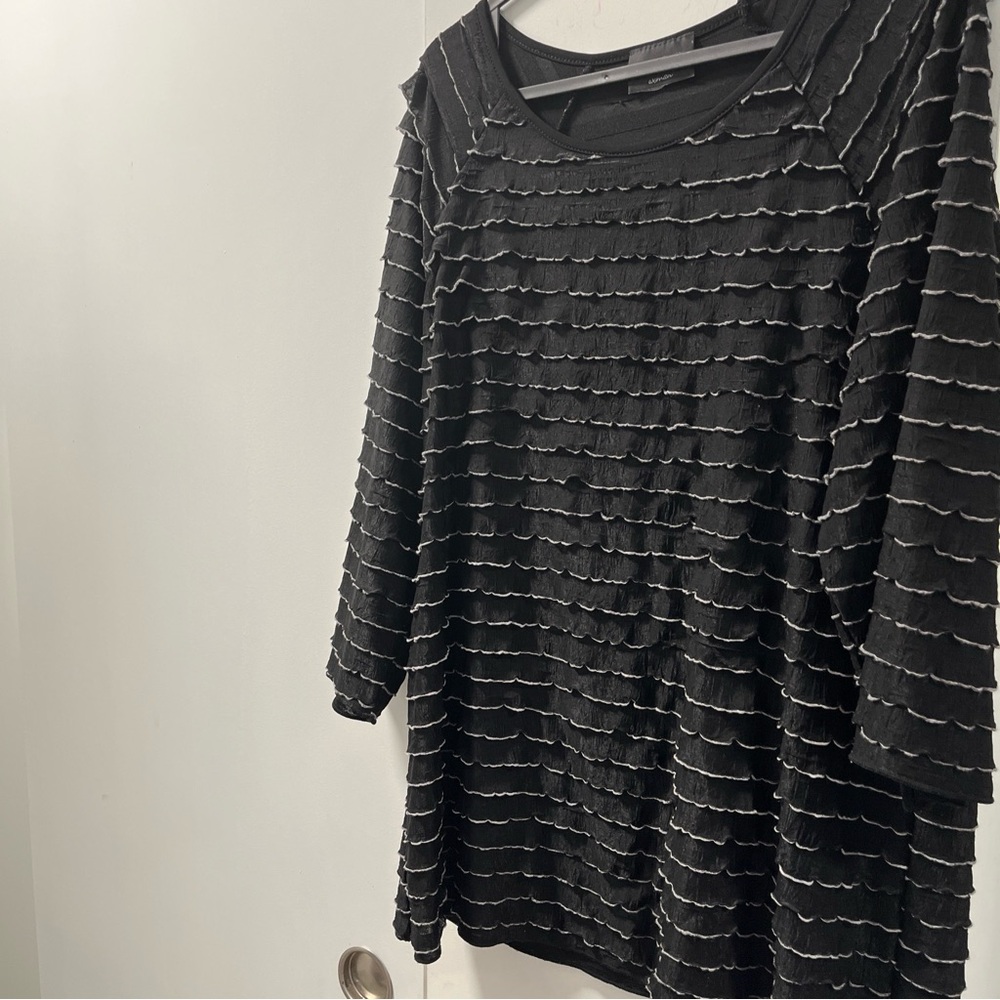 Brittany Black ruffled black top. Size 1X